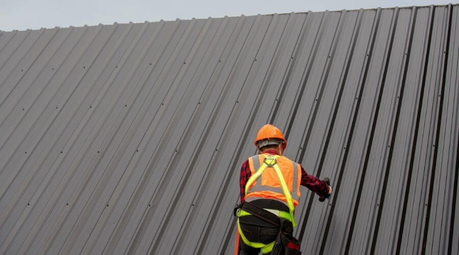 Professional metal roof installation services in Ludell, KS